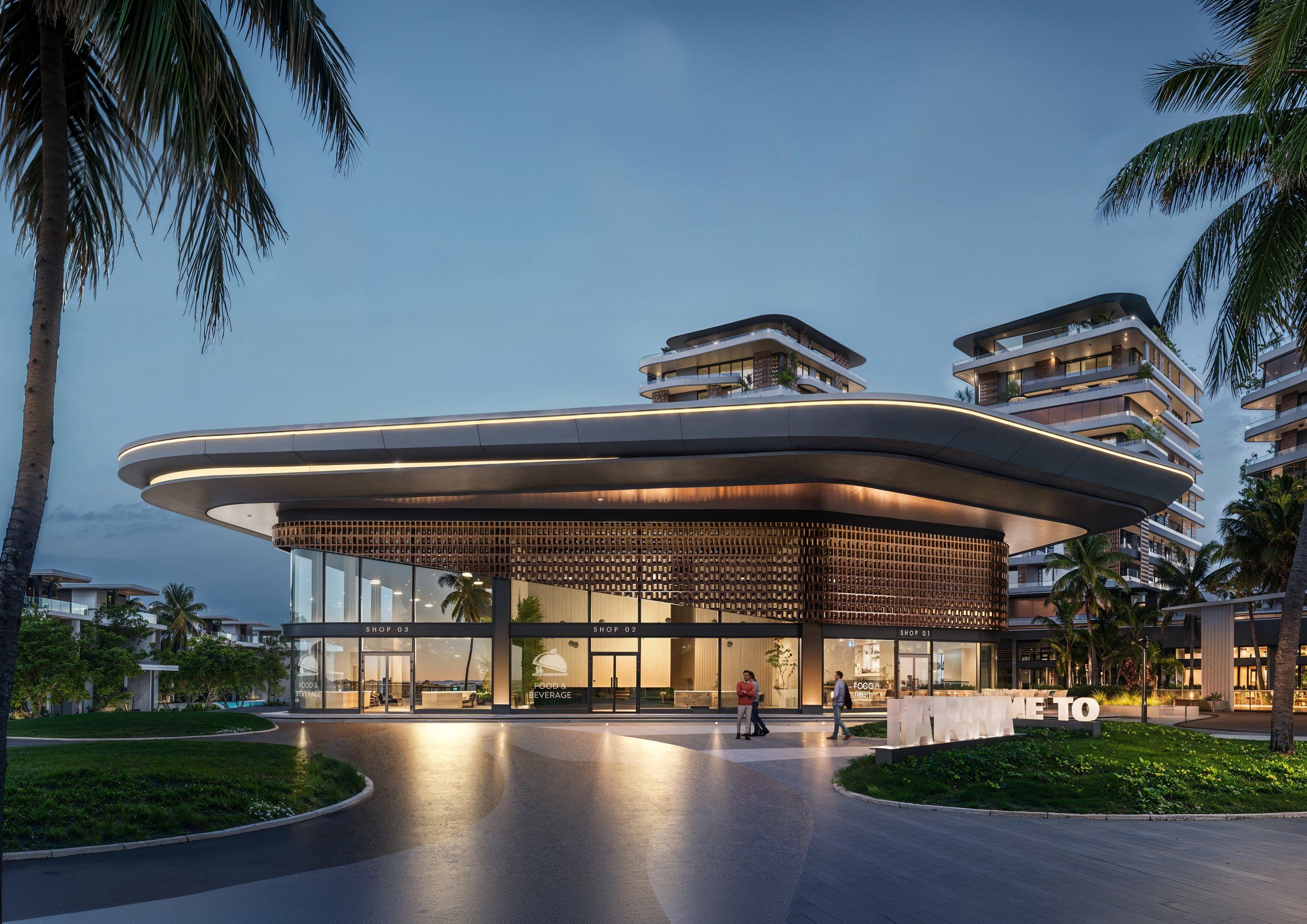 The clubhouse at dusk with the residences behind