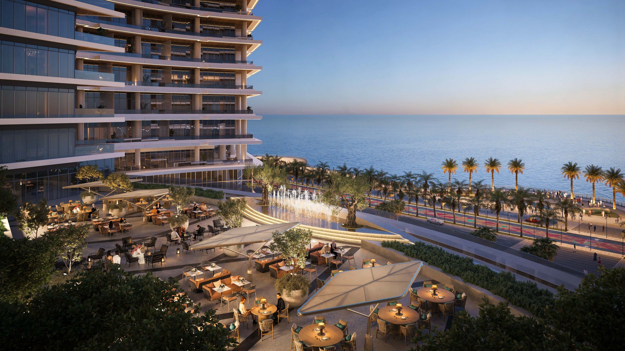 The podium terrace and pool facing the Red Sea at dusk